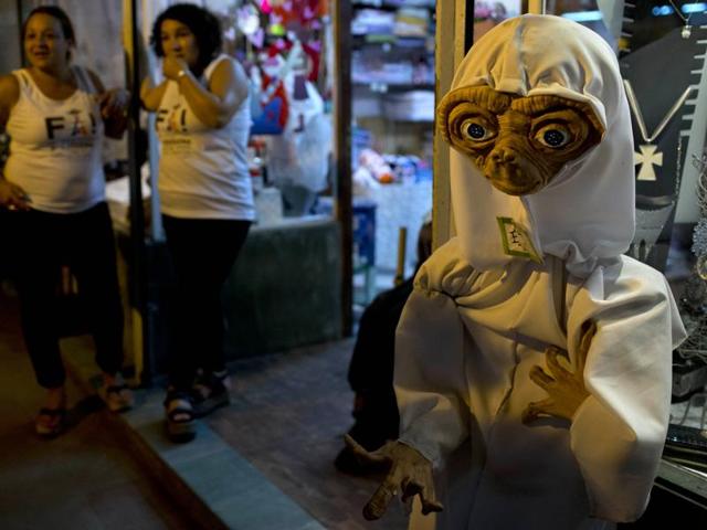 An ET doll outside a shop during the festival. (AP) An ET doll outside a shop during the festival. (AP)