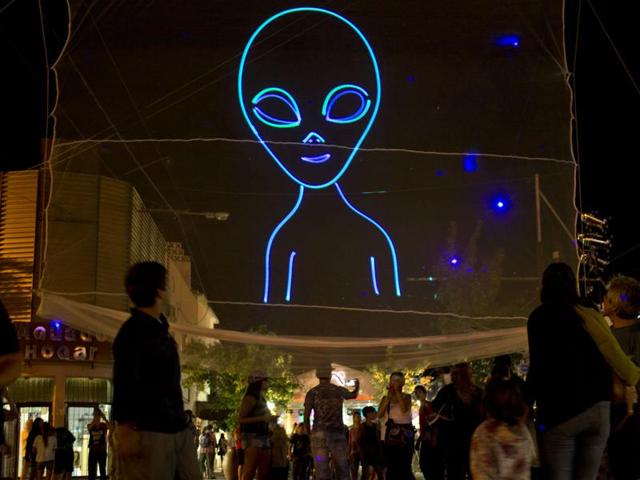 In this Feb. 13, 2016 photo, an outline of an alien stands high during the annual Alien Festival in Capilla del Monte, Cordoba, Argentina, the site of an alleged UFO sighting 30 years ago. “People come here for the energy, for the UFO sightings,” said Leonardo Fuentes, a 39-year-old tourist from Chile. (AP Photo/Natacha Pisarenko) (AP) In this Feb. 13, 2016 photo, an outline of an alien stands high during the annual Alien Festival in Capilla del Monte, Cordoba, Argentina, the site of an alleged UFO sighting 30 years ago. “People come here for the energy, for the UFO sightings,” said Leonardo Fuentes, a 39-year-old tourist from Chile. (AP Photo/Natacha Pisarenko) (AP)