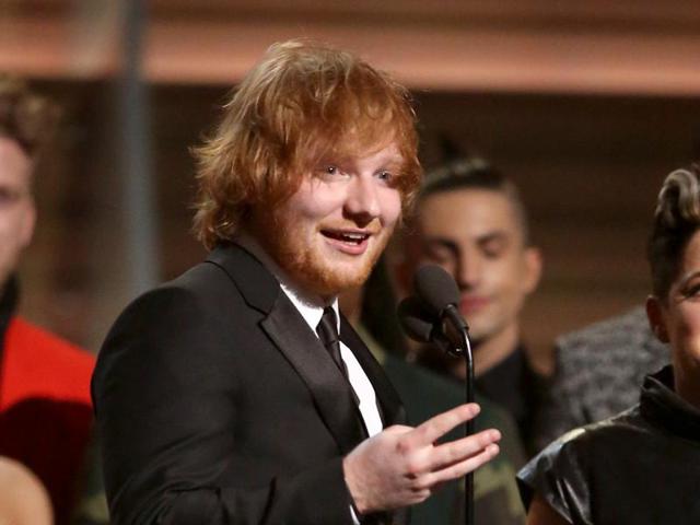 Ed Sheeran accepts the award for song of the year for Thinking Out Loud at the 58th annual Grammy Awards.  (Matt Sayles/Invision/AP) 