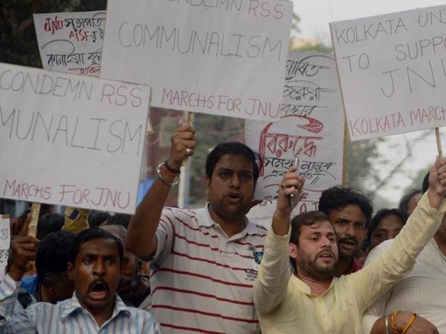 A police man tries to save a JNU student who was being beaten up during a clash between the advocates and the students outside the Patiala House Courts in New Delhi on Monday. (PTI) A police man tries to save a JNU student who was being beaten up during a clash between the advocates and the students outside the Patiala House Courts in New Delhi on Monday. (PTI)