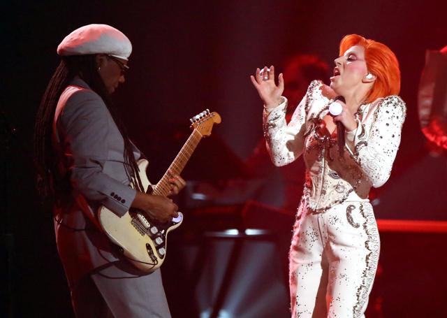 Nile Rodgers, left, and Lady Gaga perform a tribute to David Bowie at the 58th annual Grammy Awards on Monday, Feb. 15, 2016, in Los Angeles. (Matt Sayles/Invision/AP) Nile Rodgers, left, and Lady Gaga perform a tribute to David Bowie at the 58th annual Grammy Awards on Monday, Feb. 15, 2016, in Los Angeles. (Matt Sayles/Invision/AP)
