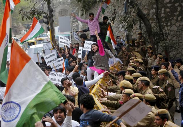 Police stop demonstrators during a protest against the students of Jawaharlal Nehru University (JNU) outside the university campus in New Delhi. (Reuters Photo) Police stop demonstrators during a protest against the students of Jawaharlal Nehru University (JNU) outside the university campus in New Delhi. (Reuters Photo)