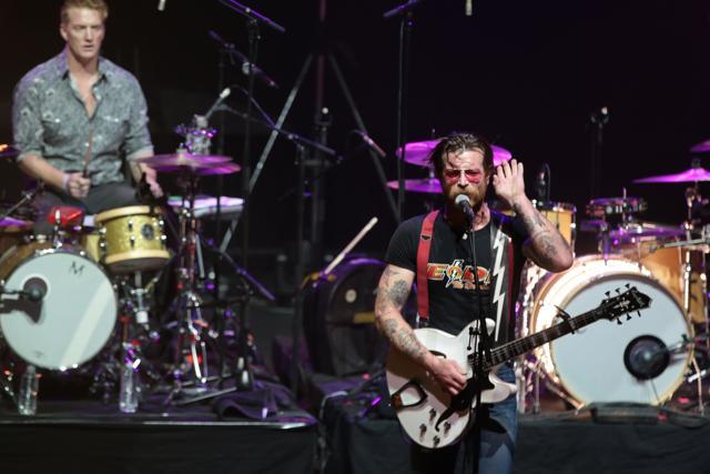 Jesse Hughes gestures during their concert at the Olympia concert hall in Paris, on February 16, 2016. (AFP) Jesse Hughes gestures during their concert at the Olympia concert hall in Paris, on February 16, 2016. (AFP)