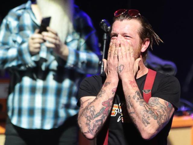 Jesse Hughes of US rock group Eagles of Death Metal, blows a kiss before the start of the concert at the Olympia concert hall in Paris, on February 16, 2016. Eagles of Death Metal, the Californian rock group who were playing at the Bataclan music hall in Paris when jihadist gunmen burst in and killed 90 people in November, returned to the French capital for a concert at the Olympia. (AFP) Jesse Hughes of US rock group Eagles of Death Metal, blows a kiss before the start of the concert at the Olympia concert hall in Paris, on February 16, 2016. Eagles of Death Metal, the Californian rock group who were playing at the Bataclan music hall in Paris when jihadist gunmen burst in and killed 90 people in November, returned to the French capital for a concert at the Olympia. (AFP)