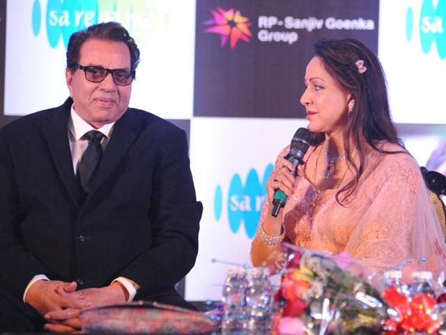 Hema Malini with Dharmendra during the launch of her new music album. (IANS) 