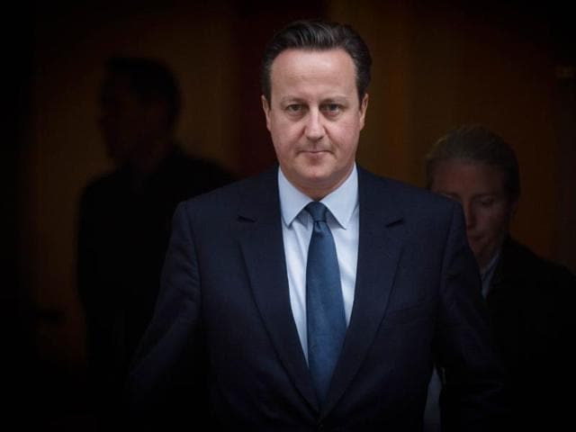 Prime Minister David Cameron leaves 10 Downing Street in London for the House of Commons to prepare for Prime Minister's Questions. (AP) Prime Minister David Cameron leaves 10 Downing Street in London for the House of Commons to prepare for Prime Minister's Questions. (AP)
