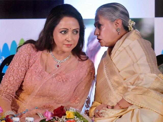 Only for Hema’s ears: Jaya Bachchan talking with Sholay’s Basanti. (PTI) 