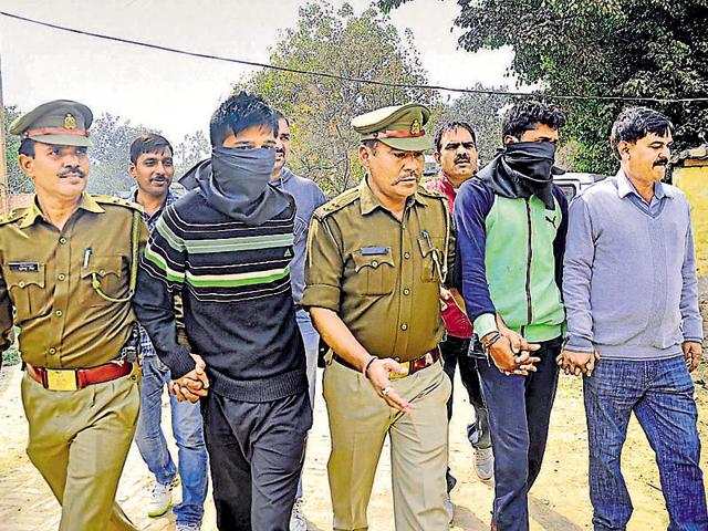 Prime accused Devendra (second from right) has 30 criminal cases pending against him. (HT Photo) Prime accused Devendra (second from right) has 30 criminal cases pending against him. (HT Photo)