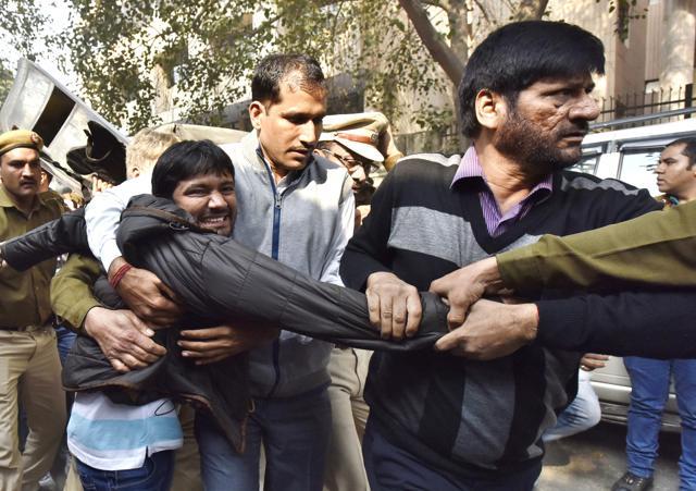 JNU Union President Kanhaiya Kumar being taken to Patiala House Court in New Delhi. (Photo by Virender Singh Gosain/ Hindustan Times) JNU Union President Kanhaiya Kumar being taken to Patiala House Court in New Delhi. (Photo by Virender Singh Gosain/ Hindustan Times)