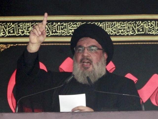 Lebanon's Hezbollah leader Sayyed Hassan Nasrallah addresses his supporters during a public appearance at a religious procession to mark Ashura in Beirut. (Reuters Photo)