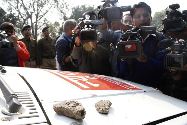 Stones lying on a media van which were allegedly thrown from inside the Patiala House Court as Delhi Police produced JNU Union President Kanhaiya Kumar. (Photo by Sanchit Khanna/ Hindustan Times) Stones lying on a media van which were allegedly thrown from inside the Patiala House Court as Delhi Police produced JNU Union President Kanhaiya Kumar. (Photo by Sanchit Khanna/ Hindustan Times)