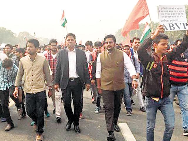 Vikram Chauhan (in black coat) attending a ABVP protest march. He had posted this photo on his Facebook page. Vikram Chauhan (in black coat) attending a ABVP protest march. He had posted this photo on his Facebook page.
