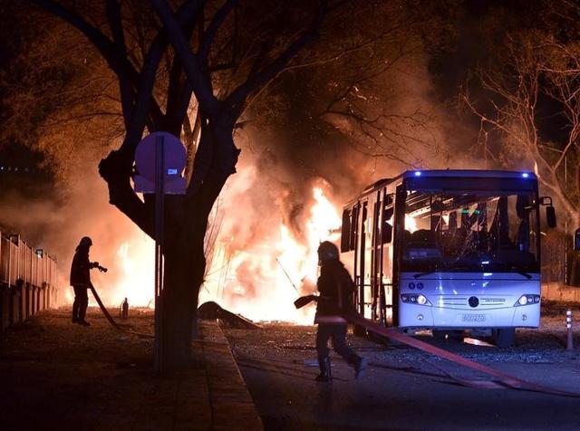 Firefighters prepare to extinguish the aftermath of the car bomb in Ankara. (REUTERS) Firefighters prepare to extinguish the aftermath of the car bomb in Ankara. (REUTERS)