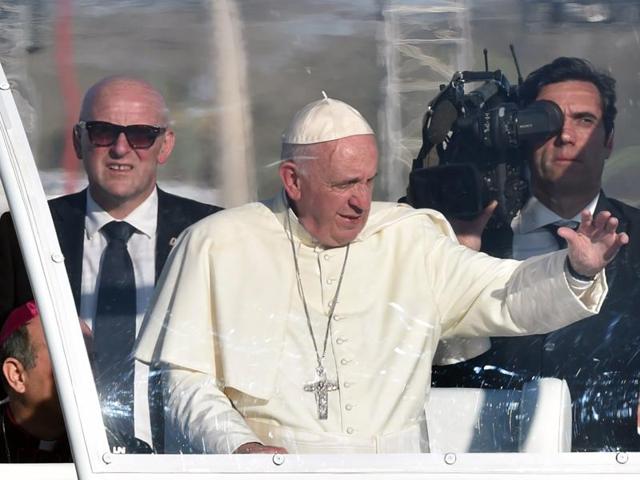 Pope Francis waves as he arrives on the popemobile to celebrate mass at the Ciudad Juarez fairgrounds in Chihuahua state, Mexico on February 17, 2016. (AFP) Pope Francis waves as he arrives on the popemobile to celebrate mass at the Ciudad Juarez fairgrounds in Chihuahua state, Mexico on February 17, 2016. (AFP)