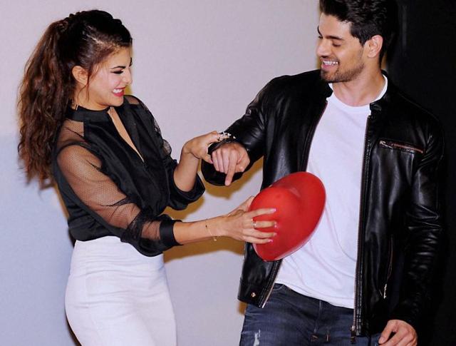 Actors Jacqueline Fernandez and Sooraj Pancholi during the release of teaser of the song ‘GF BF’ in Mumbai on Wednesday. (PTI) 