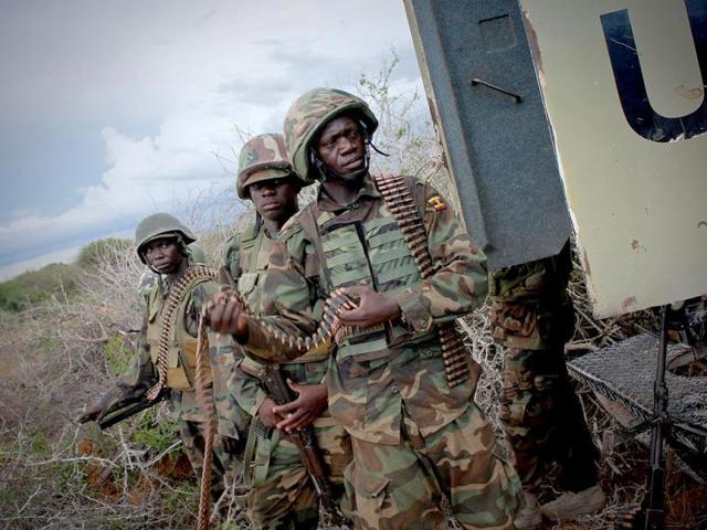 Soldiers stand next to an armoured carrier during an operation to seize and liberate territories from Al-Shabaab militants in Deyniile. (Reuters Photo) Soldiers stand next to an armoured carrier during an operation to seize and liberate territories from Al-Shabaab militants in Deyniile. (Reuters Photo)