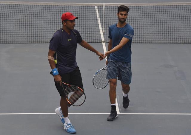 Mahesh Bhupathi and Yuki Bhambri in action in Delhi Open 2016 at DLTA in New Delhi. (HT Photo) Mahesh Bhupathi and Yuki Bhambri in action in Delhi Open 2016 at DLTA in New Delhi. (HT Photo)