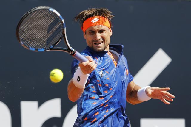 David Ferrer of Spain returns the ball to compatriot Albert Ramos-Vinolas. (AP Photo) David Ferrer of Spain returns the ball to compatriot Albert Ramos-Vinolas. (AP Photo)