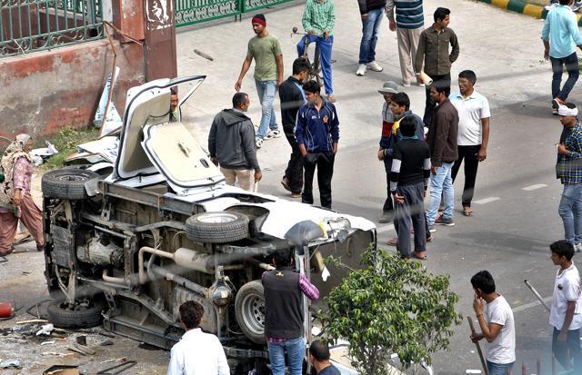 Jat students damage a vehicle during protests demanding reservation, in Haryana. . (Manoj Dhaka/HT Photo) Jat students damage a vehicle during protests demanding reservation, in Haryana. . (Manoj Dhaka/HT Photo)