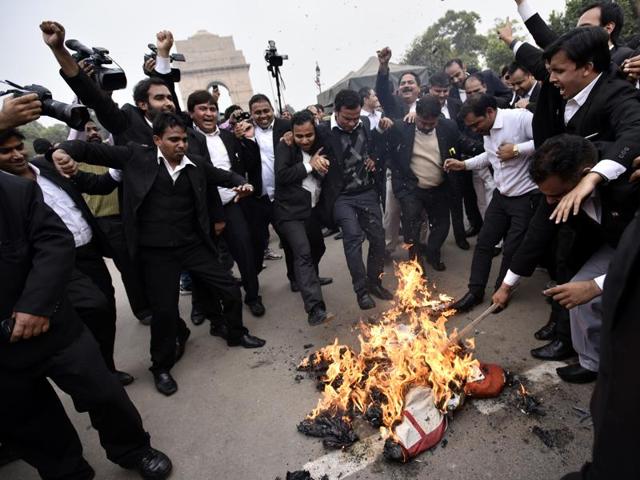Led by Vikram Chauhan and Yashpal Singh -- allegedly involved in an attack on journalists inside the court complex on Monday -- the protesting lawyers raised slogans such as ‘do not spare traitors’ and ‘Vande Mataram’ and also termed those students as “anti-national”. (Arun Sharma/HT Photo) Led by Vikram Chauhan and Yashpal Singh -- allegedly involved in an attack on journalists inside the court complex on Monday -- the protesting lawyers raised slogans such as ‘do not spare traitors’ and ‘Vande Mataram’ and also termed those students as “anti-national”. (Arun Sharma/HT Photo)
