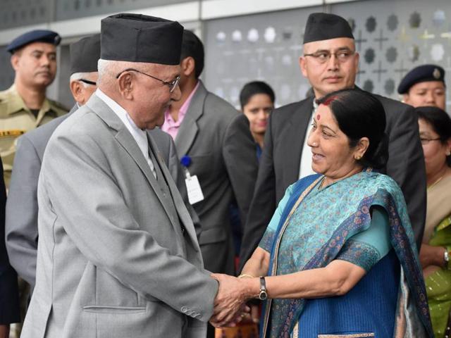External affairs minister Sushma Swaraj received Oli, accompanied by a 77-member delegation, at the airport.(PTI)