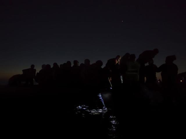 In this image released by World Press Photo titled ‘Under the Cover of Darkness’ by photographer Paul Hansen for Dagens Nyheter which won second prize General News singles category shows refugees traveling in darkness through Europe to avoid detection, Lesbos, Greece, Dec. 6, 2015. (Paul Hansen/ Dagens Nyheter/ AP) In this image released by World Press Photo titled ‘Under the Cover of Darkness’ by photographer Paul Hansen for Dagens Nyheter which won second prize General News singles category shows refugees traveling in darkness through Europe to avoid detection, Lesbos, Greece, Dec. 6, 2015. (Paul Hansen/ Dagens Nyheter/ AP)
