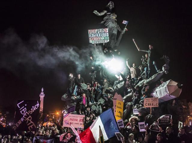 In this image released by World Press Photo titled "March Against Terrorism in Paris" by photographer Corentin Fohlen, Divergence for Stern and Paris Match, which won second prize in the Spot News singles category shows a demonstration against terrorism in Paris, after a series of five attacks occurred across the Ile-de-France region, beginning at the headquarters for satirical newspaper Charlie Hebdo, Paris, France, Jan. 11, 2015.(Corentin Fohlen/Divergence for Stern and Paris Match, World Press Photo via AP) (Corentin Fohlen/ via AP) In this image released by World Press Photo titled "March Against Terrorism in Paris" by photographer Corentin Fohlen, Divergence for Stern and Paris Match, which won second prize in the Spot News singles category shows a demonstration against terrorism in Paris, after a series of five attacks occurred across the Ile-de-France region, beginning at the headquarters for satirical newspaper Charlie Hebdo, Paris, France, Jan. 11, 2015.(Corentin Fohlen/Divergence for Stern and Paris Match, World Press Photo via AP) (Corentin Fohlen/ via AP)