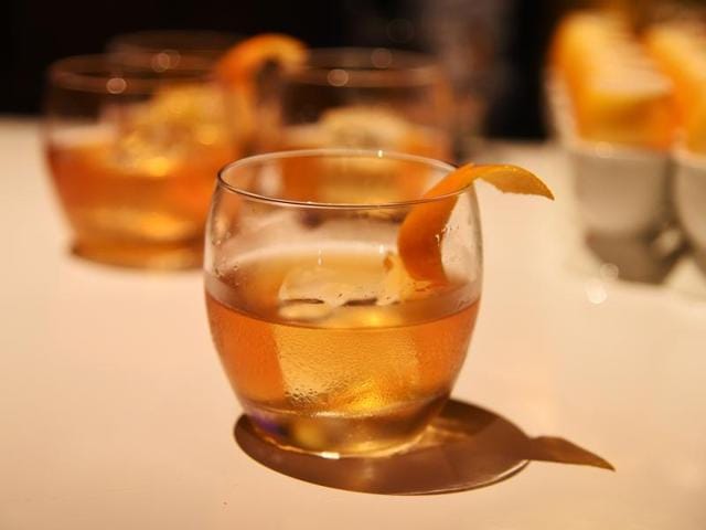A Demure & Dashing, a Haig Club Single Grain Scotch Whisky specialty cocktail made with spiced honey syrup, Galliano Liqueur, bitters and an orange twist, is displayed at a preview of the food and décor of this year’s Governors Ball, the Academy’s official post-Oscar celebration. (AFP) 
