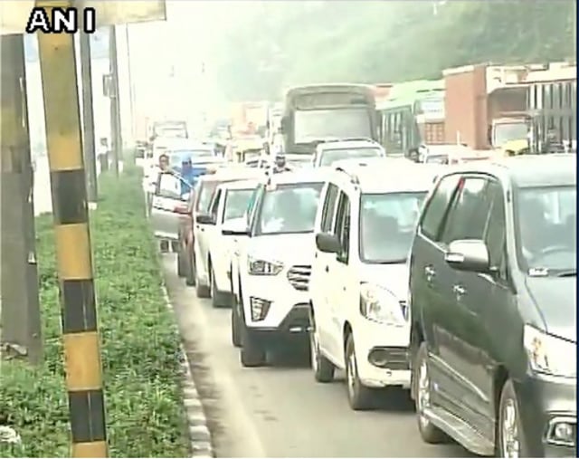 Traffic jam on Mall Road outside North Campus, Delhi University due to protest by students demanding reservation (ANI)