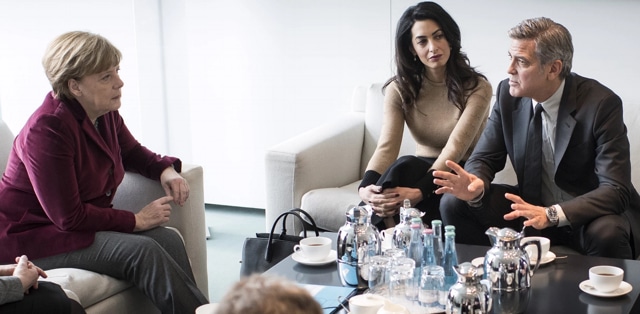 German Chancellor Angela Merkel met George Clooney and wife, lawyer Amal Clooney, to discuss refugee crisis.