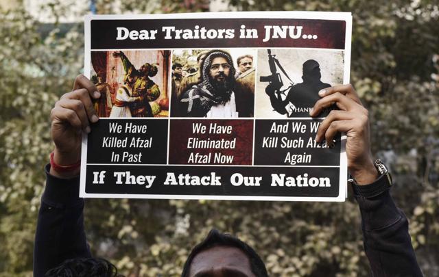 Supporters of ABVP carry placards during protest. (Vipin Kumar/ Hindustan Times)