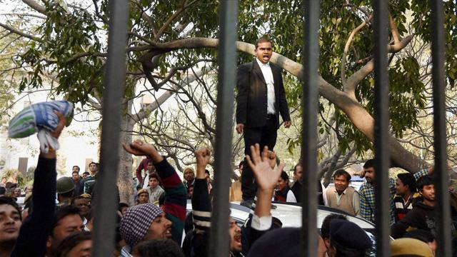 A lawyer shouts slogans at Patiala House courts where JNUSU president Kanhaiya Kumar was being produced. (PTI) A lawyer shouts slogans at Patiala House courts where JNUSU president Kanhaiya Kumar was being produced. (PTI)