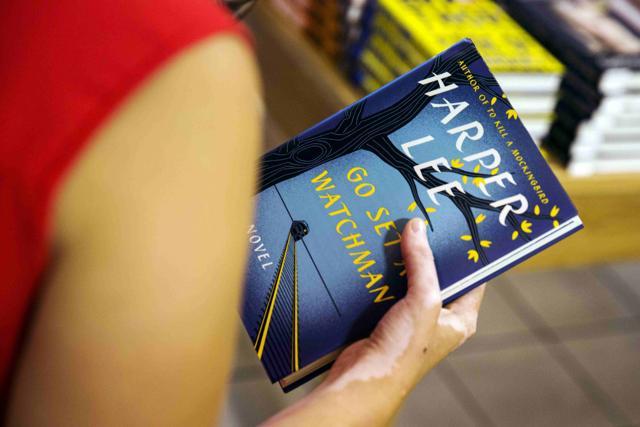 A woman with a copy of Harper Lee's Go Set a Watchman. (REUTERS) A woman with a copy of Harper Lee's Go Set a Watchman. (REUTERS)