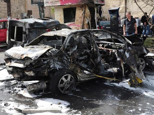 At least 25 people were killed in twin car bomb blasts that hit the Syrian city of Homs. (AFP Photo) At least 25 people were killed in twin car bomb blasts that hit the Syrian city of Homs. (AFP Photo)
