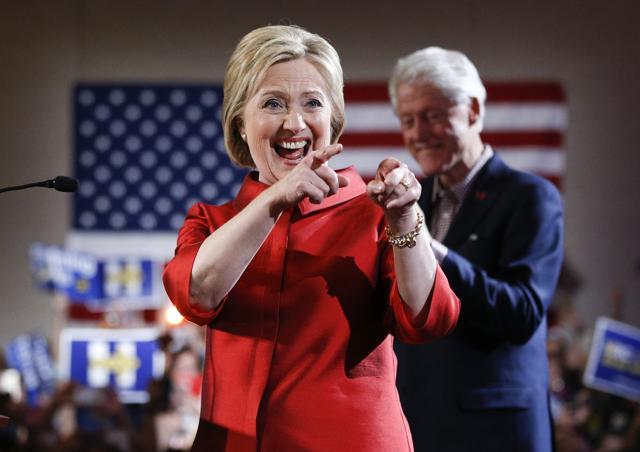 Democratic presidential candidate Hillary Clinton greets supporters with her husband and former President Bill Clinton at a Nevada Democratic caucus rally in Las Vegas on Saturday. (AP) Democratic presidential candidate Hillary Clinton greets supporters with her husband and former President Bill Clinton at a Nevada Democratic caucus rally in Las Vegas on Saturday. (AP)