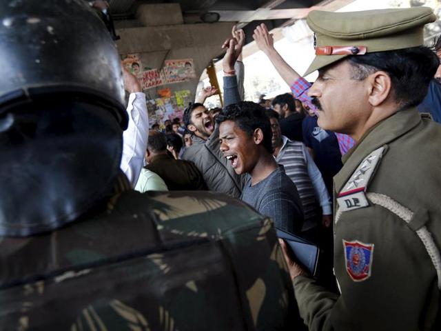 Demonstrators from the Jat community shout slogans next to police during a protest in New Delhi. (Reuters Photo) Demonstrators from the Jat community shout slogans next to police during a protest in New Delhi. (Reuters Photo)