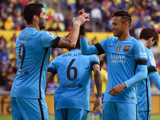 Barcelona's Luis Suarez celebrates a goal with Neymar during the match against UD Las Palmas. (AFP Photo) Barcelona's Luis Suarez celebrates a goal with Neymar during the match against UD Las Palmas. (AFP Photo)