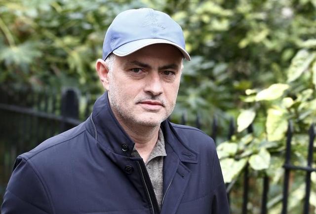 Former Chelsea soccer club manager Jose Mourinho walks near to his home in London.(Reuters Photo)