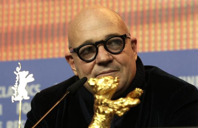 Gianfranco Rosi, director of Fuocoammare sits behind his Golden Bear for the Best Film during a press conference after the award ceremony of the 2016 Berlinale Film Festival in Berlin. (AP) Gianfranco Rosi, director of Fuocoammare sits behind his Golden Bear for the Best Film during a press conference after the award ceremony of the 2016 Berlinale Film Festival in Berlin. (AP)