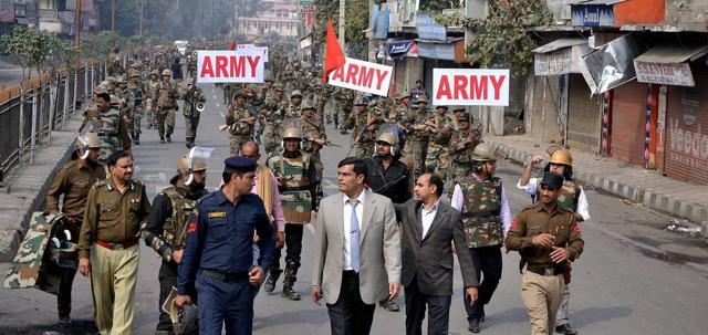 Army during a flagmarch in Rohtak city under curfew following the Jats protests. (PTI) Army during a flagmarch in Rohtak city under curfew following the Jats protests. (PTI)