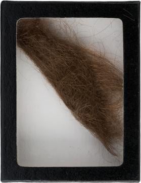 This undated photo provided by Heritage Auctions shows a box containing a lock of John Lennon's hair that was snipped as he prepared for a film role. Dallas-based Heritage Auctions said Saturday that the 4-inch (10-centimeter) lock of hair was purchased for $35,000 by Paul Fraser, a United Kingdom-based memorabilia collector. (AP) This undated photo provided by Heritage Auctions shows a box containing a lock of John Lennon's hair that was snipped as he prepared for a film role. Dallas-based Heritage Auctions said Saturday that the 4-inch (10-centimeter) lock of hair was purchased for $35,000 by Paul Fraser, a United Kingdom-based memorabilia collector. (AP)