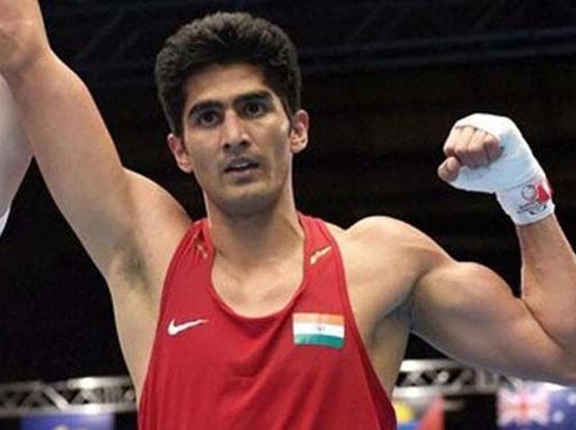 Star Indian boxer Vijender Singh’s maiden professional title bout will tentatively take place on June 11 at the Indira Gandhi Indoor stadium. (PTI Photo) Star Indian boxer Vijender Singh’s maiden professional title bout will tentatively take place on June 11 at the Indira Gandhi Indoor stadium. (PTI Photo)