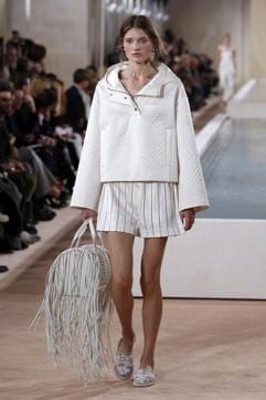 Balenciaga brought fringing to handbags for spring/summer 2016. A model presents a creation for Balenciaga during the 2016 Spring/Summer ready-to-wear collection fashion show, on October 2, 2015 in Paris. (AFP) Balenciaga brought fringing to handbags for spring/summer 2016. A model presents a creation for Balenciaga during the 2016 Spring/Summer ready-to-wear collection fashion show, on October 2, 2015 in Paris. (AFP)