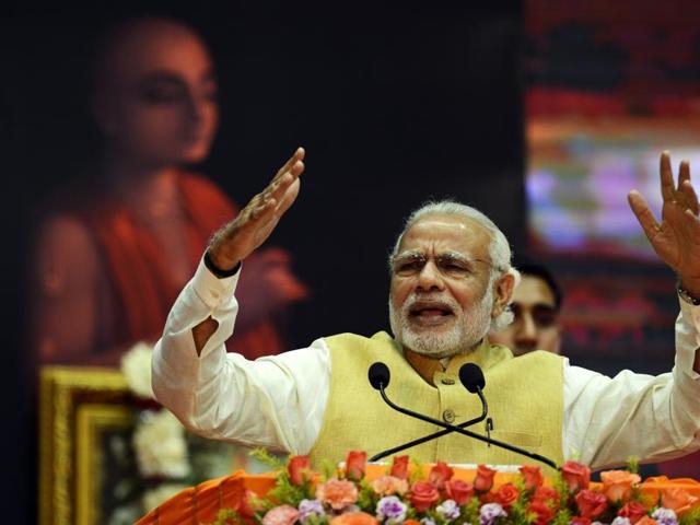 Prime Minister Narendra Modi speaks in Kolkata. Modi has been criticised for claiming there was a conspiracy to destabilise his government.(AFP)