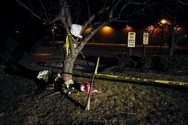 Flowers are placed at a makeshift memorial near a Cracker Barrel restaurant in Kalamazoo County, Michigan on Sunday. (Reuters) Flowers are placed at a makeshift memorial near a Cracker Barrel restaurant in Kalamazoo County, Michigan on Sunday. (Reuters)