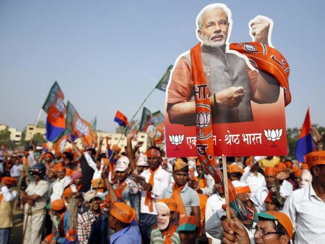 BJP supporters taking out a rally during an election campaign in Varanasi, in Uttar Pradesh.(AP File Photo) BJP supporters taking out a rally during an election campaign in Varanasi, in Uttar Pradesh.(AP File Photo)