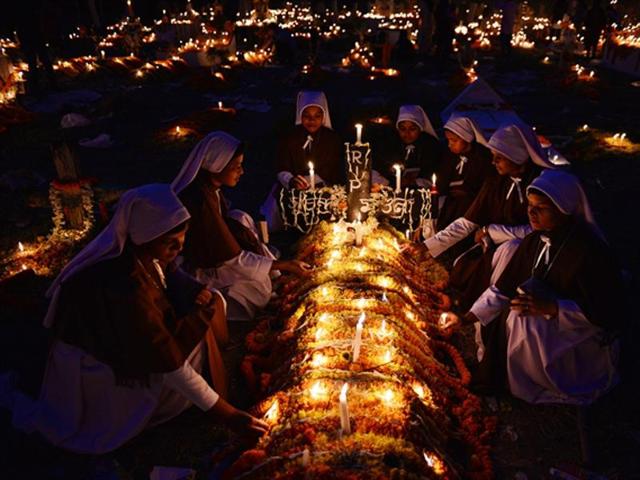 This image taken in Puruliya village shows people marking the All Souls’ Day, which remembers the loved ones who have died. (Sanghamitra Sarkar/2016 Sony World Photography Awards) This image taken in Puruliya village shows people marking the All Souls’ Day, which remembers the loved ones who have died. (Sanghamitra Sarkar/2016 Sony World Photography Awards)