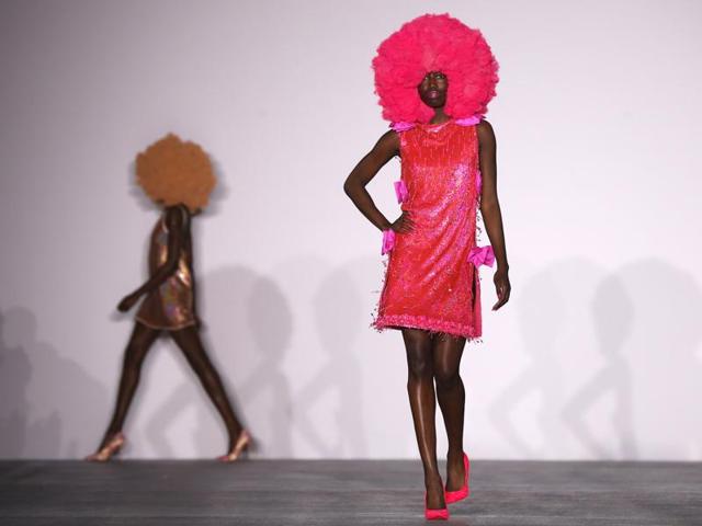 Bright stilettoes, afros and dresses made up Ashish’s collection. (REUTERS) Bright stilettoes, afros and dresses made up Ashish’s collection. (REUTERS)
