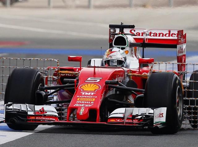 Sebastian Vettel of Germany drives the new Ferrari F1 car during a testing session.(AP Photo)
