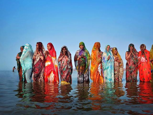 Every year in the month of January, lakhs of devotees visit the Gangasagar fair in West Bengal. It is the second biggest fair in the country. Abhijit Banerjee captures devotees while they worship the Sun. (Abhijit Banerjee/2016 Sony World Photography Awards) Every year in the month of January, lakhs of devotees visit the Gangasagar fair in West Bengal. It is the second biggest fair in the country. Abhijit Banerjee captures devotees while they worship the Sun. (Abhijit Banerjee/2016 Sony World Photography Awards)
